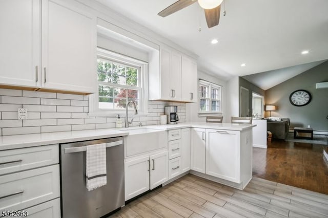 22 Corwin St, Randolph Twp, NJ 07869 - kitchen with dishwasher, open floor plan, healthy amount of natural light, a peninsula, and vaulted ceiling