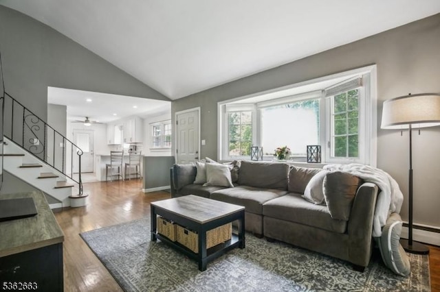22 Corwin St, Randolph Twp, NJ 07869 - living area with plenty of natural light, dark wood-style floors, stairs, lofted ceiling, and baseboard heating