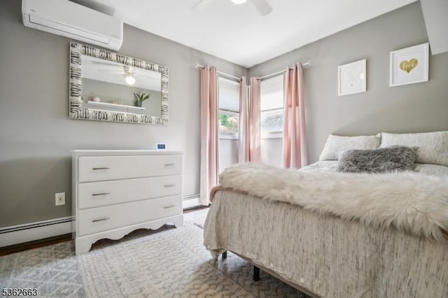 22 Corwin St, Randolph Twp, NJ 07869 - bedroom featuring an AC wall unit, a baseboard heating unit, a baseboard radiator, and a ceiling fan