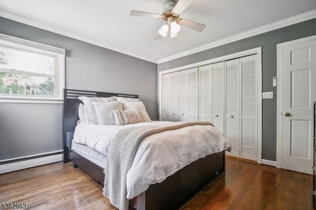 22 Corwin St, Randolph Twp, NJ 07869 - bedroom with a closet, wood finished floors, crown molding, baseboards, and a ceiling fan