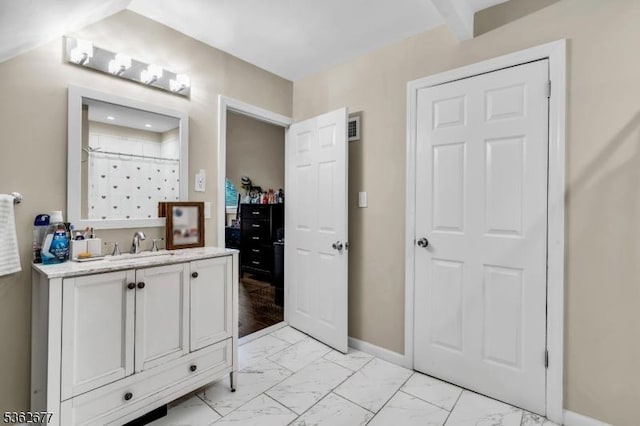 146 Williamson Ave, Hillside Twp, NJ 07205 - full bathroom with marble finish flooring, vanity, baseboards, and a shower with shower curtain