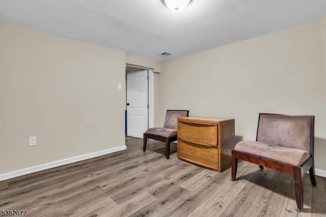 146 Williamson Ave, Hillside Twp, NJ 07205 - living area featuring light wood-style flooring and baseboards