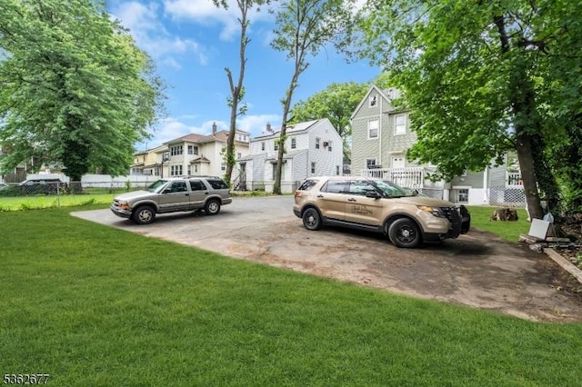 146 Williamson Ave, Hillside Twp, NJ 07205 - view of parking / parking lot featuring a residential view