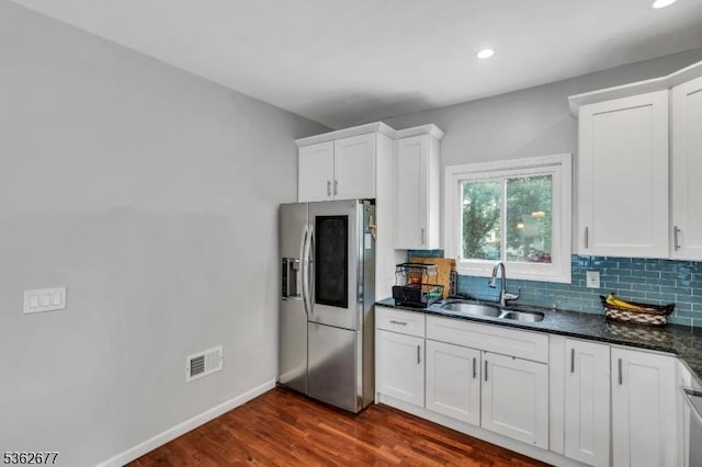 146 Williamson Ave, Hillside Twp, NJ 07205 - kitchen featuring stainless steel fridge with ice dispenser, a sink, backsplash, white cabinets, and recessed lighting