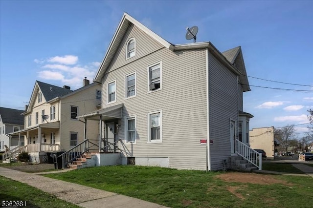 141 Berckman St, Plainfield City, NJ 07062 - view of side of home featuring a lawn