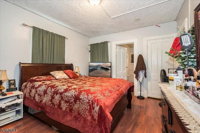 141 Berckman St, Plainfield City, NJ 07062 - bedroom with dark wood finished floors and a textured ceiling
