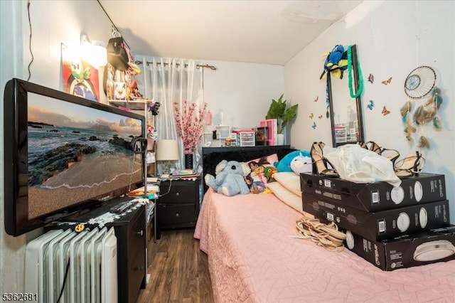 141 Berckman St, Plainfield City, NJ 07062 - bedroom featuring radiator heating unit and wood finished floors