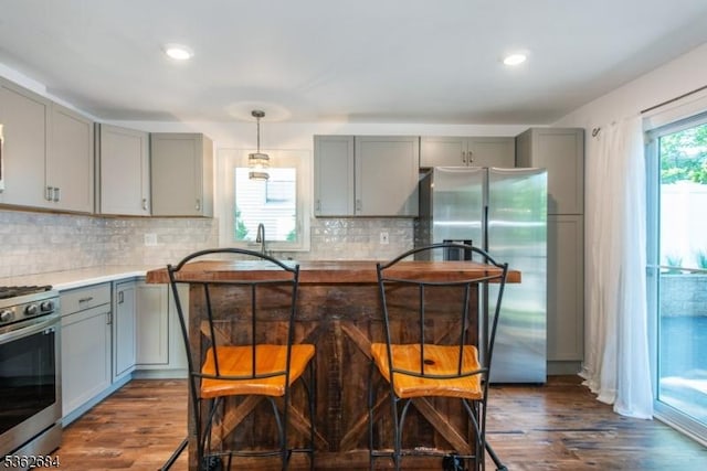 44 Lincoln Ave, Livingston Twp, NJ 07039 - kitchen with gray cabinetry, appliances with stainless steel finishes, dark wood-style flooring, light countertops, and recessed lighting