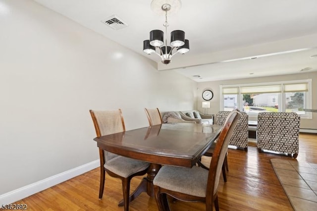 1589 Julian Ter, Union Twp, NJ 07083 - dining room featuring a chandelier and wood finished floors