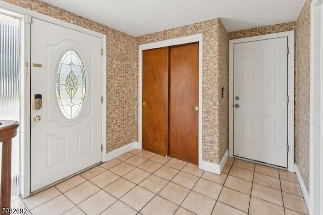 1589 Julian Ter, Union Twp, NJ 07083 - foyer with wallpapered walls and light tile patterned flooring