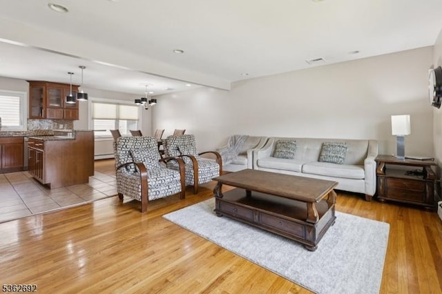1589 Julian Ter, Union Twp, NJ 07083 - living room featuring light wood finished floors and a chandelier