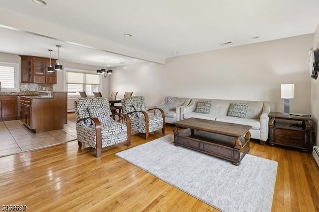1589 Julian Ter, Union Twp, NJ 07083 - living area featuring light wood-style floors, a chandelier, and recessed lighting