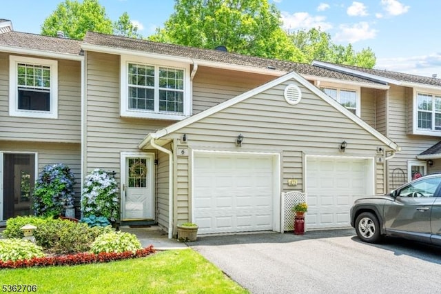 6 Pelican Pt, Hampton Twp, NJ 07860 - townhome / multi-family property featuring driveway and an attached garage