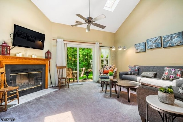 6 Pelican Pt, Hampton Twp, NJ 07860 - carpeted living area with a fireplace with flush hearth, ceiling fan, high vaulted ceiling, and a skylight