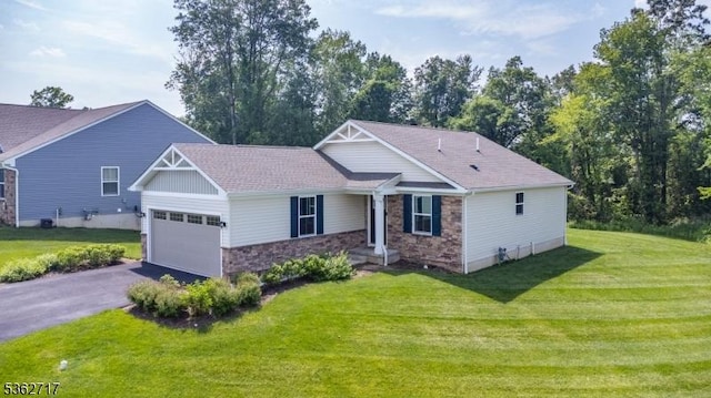 49 Coventry Rd, Hardyston Twp, NJ 07419 - view of front facade featuring stone siding, a front lawn, and an attached garage