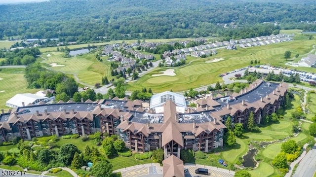 49 Coventry Rd, Hardyston Twp, NJ 07419 - drone / aerial view of a golf club, apartment complex / building, and a heavily wooded area