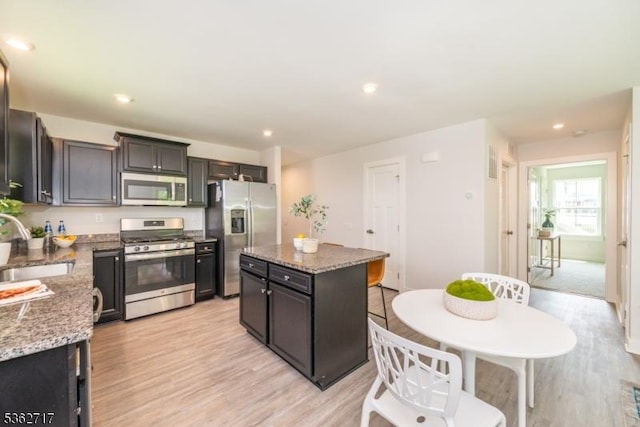 49 Coventry Rd, Hardyston Twp, NJ 07419 - kitchen with appliances with stainless steel finishes, a center island, a sink, light wood-style flooring, and recessed lighting