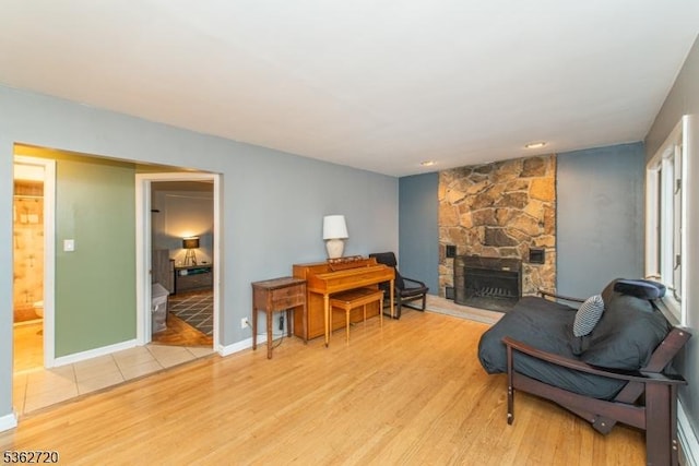 17 Barnida Dr, East Hanover Twp, NJ 07936 - living area with light wood-style flooring and a stone fireplace