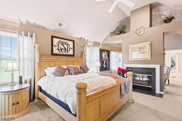 2 Skyview Dr, Sparta Twp, NJ 07871 - bedroom with light colored carpet, high vaulted ceiling, a fireplace with flush hearth, and ceiling fan