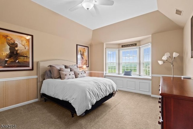 2 Skyview Dr, Sparta Twp, NJ 07871 - carpeted bedroom featuring wainscoting, vaulted ceiling, and a ceiling fan