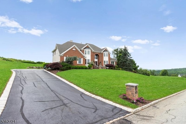 2 Skyview Dr, Sparta Twp, NJ 07871 - view of front of house with a front lawn and brick siding