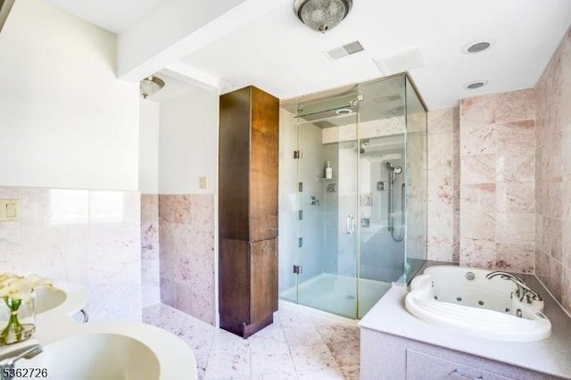 61 Joanna Way, Millburn Twp, NJ 07078 - full bathroom featuring tile walls, a shower stall, and a tub with jets