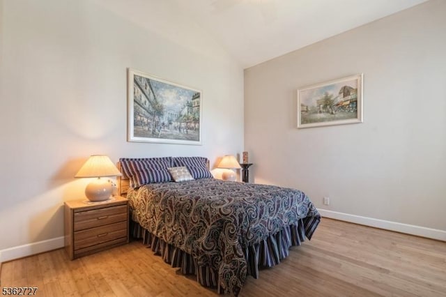 27 Mare Haven Ct, North Brunswick Twp, NJ 08902 - bedroom with light wood-style flooring, baseboards, and lofted ceiling