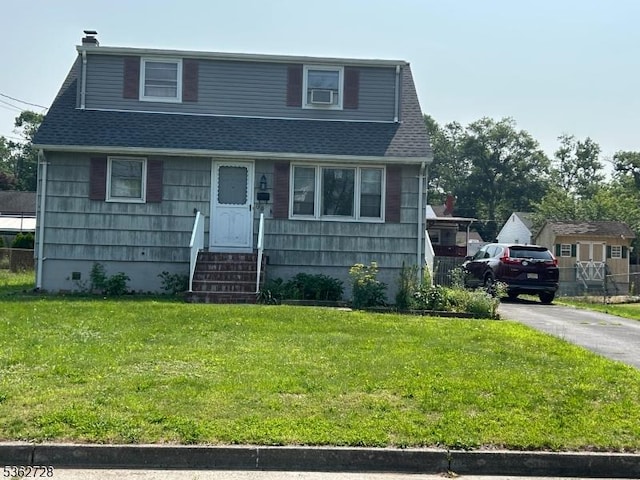 130 2nd St, Middlesex Boro, NJ 08846 - bungalow-style house with entry steps, a front lawn, and roof with shingles