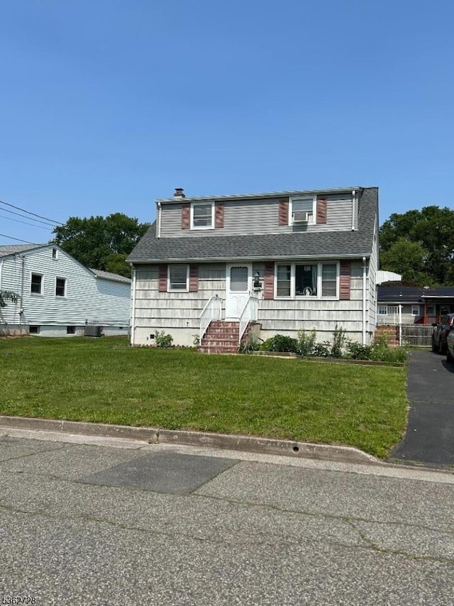 130 2nd St, Middlesex Boro, NJ 08846 - view of front of home featuring a front yard and a shingled roof
