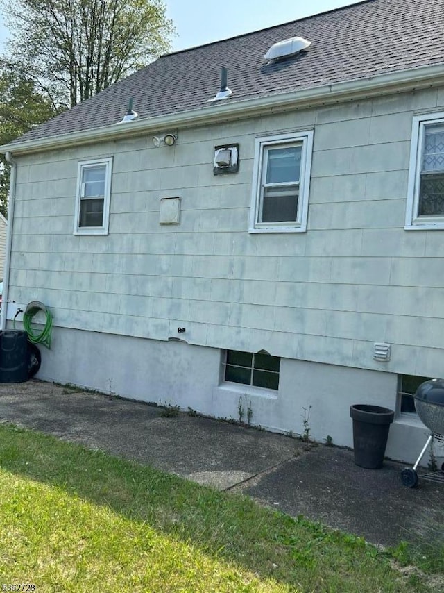 130 2nd St, Middlesex Boro, NJ 08846 - view of property exterior featuring roof with shingles