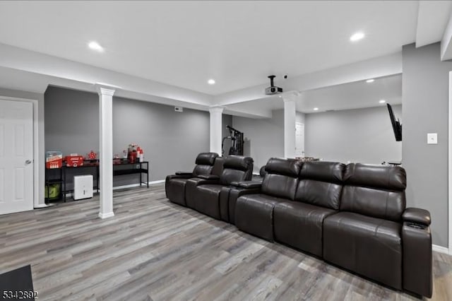 522 Stanhope Rd, Byram Twp, NJ 07871 - home theater room featuring light wood-style floors, ornate columns, and recessed lighting