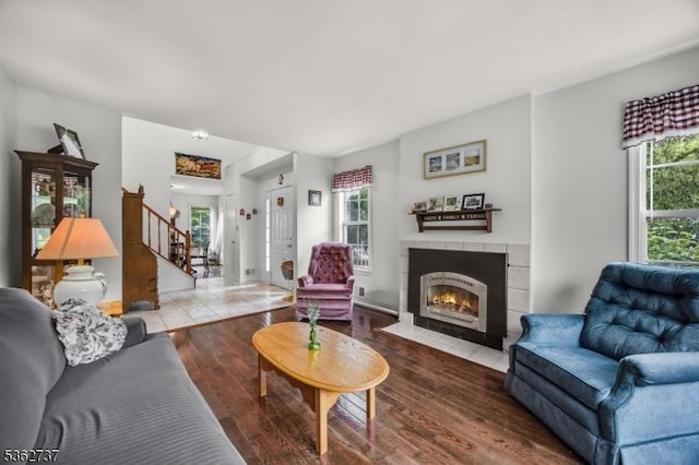 17 Willow Cir, Hamburg Boro, NJ 07419 - living room with a fireplace, stairs, plenty of natural light, and wood finished floors