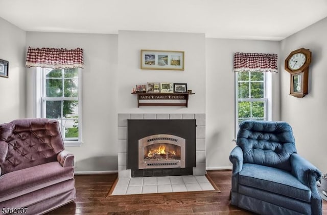 17 Willow Cir, Hamburg Boro, NJ 07419 - living area with plenty of natural light, wood finished floors, a tiled fireplace, and baseboards
