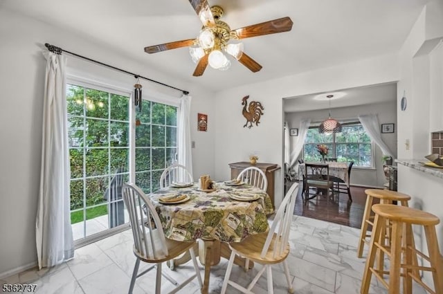 17 Willow Cir, Hamburg Boro, NJ 07419 - dining space featuring light marble finish floors and ceiling fan