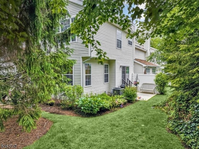 17 Willow Cir, Hamburg Boro, NJ 07419 - rear view of property featuring a yard and central AC unit