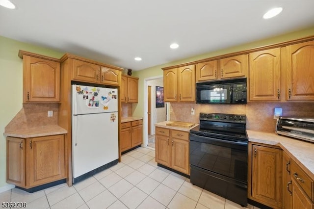 19 Paderewski Rd, Jefferson Twp, NJ 07438 - kitchen with black appliances, light countertops, backsplash, recessed lighting, and light tile patterned floors