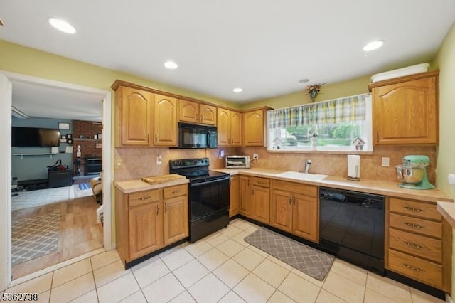 19 Paderewski Rd, Jefferson Twp, NJ 07438 - kitchen featuring black appliances, a sink, light countertops, and recessed lighting
