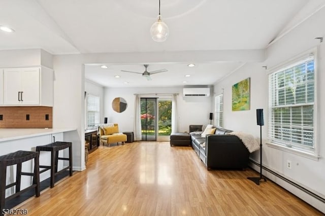 174 Garfield Pl, Maplewood Twp, NJ 07040 - living area featuring a baseboard radiator, an AC wall unit, healthy amount of natural light, ceiling fan, and recessed lighting