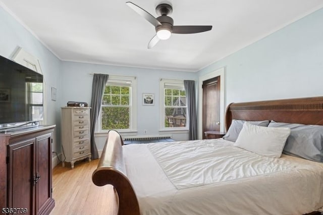 174 Garfield Pl, Maplewood Twp, NJ 07040 - bedroom with light wood-type flooring, a ceiling fan, and ornamental molding