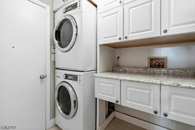 3607 Park Pl, Springfield Twp, NJ 07081 - laundry room featuring cabinet space and stacked washer / dryer
