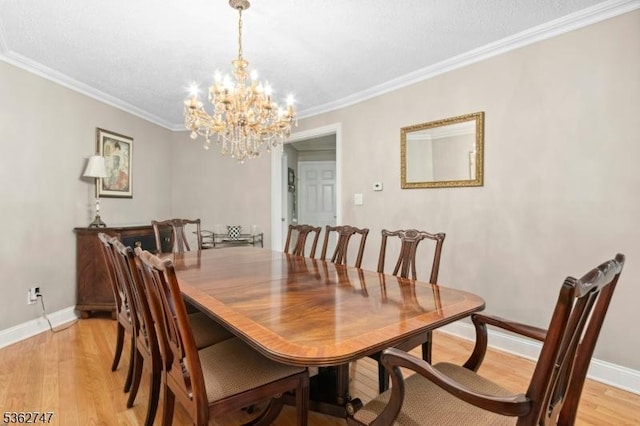 3607 Park Pl, Springfield Twp, NJ 07081 - dining space featuring a chandelier, light wood-type flooring, and ornamental molding