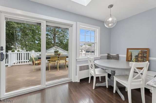 30 Hillcrest Ter, Verona Twp, NJ 07044 - dining area featuring dark wood-style flooring, radiator, and a skylight