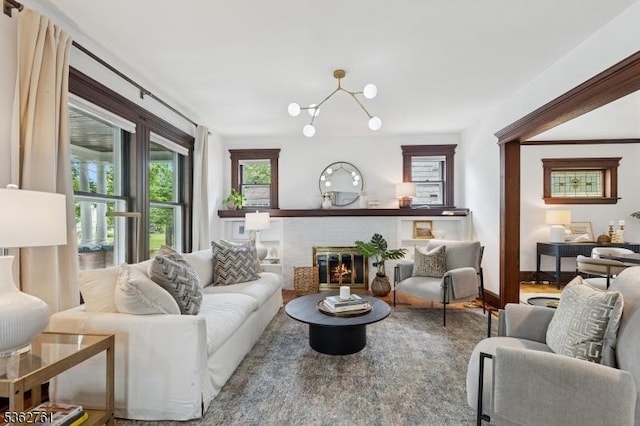 30 Hillcrest Ter, Verona Twp, NJ 07044 - living room featuring a chandelier and a fireplace