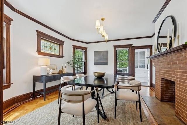 30 Hillcrest Ter, Verona Twp, NJ 07044 - dining space featuring crown molding, a brick fireplace, and a chandelier