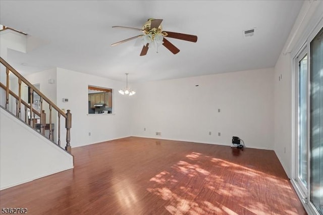 450 Saint Giles Ct, Franklin Twp, NJ 08873 - unfurnished living room featuring ceiling fan, stairway, a chandelier, and wood finished floors