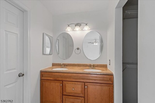 450 Saint Giles Ct, Franklin Twp, NJ 08873 - bathroom featuring double vanity and a ceiling fan