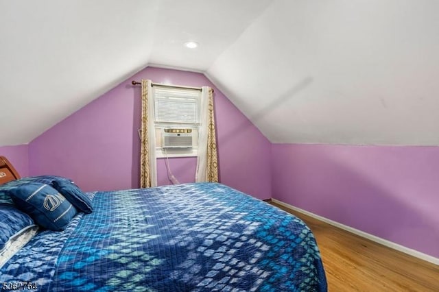 128 Parkside Rd, Plainfield City, NJ 07060 - bedroom with wood finished floors, lofted ceiling, and cooling unit