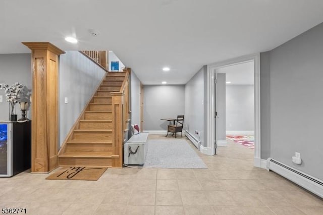 41 College Rd, Netcong Boro, NJ 07857 - finished below grade area featuring baseboard heating, stairway, recessed lighting, light tile patterned floors, and baseboards