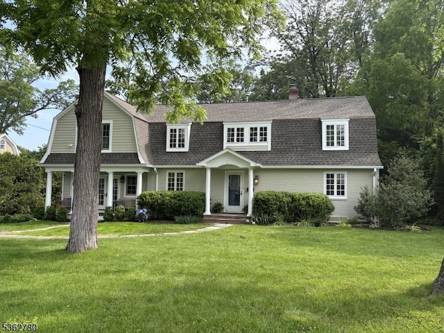 88 Pomeroy Rd, Madison Boro, NJ 07940 - colonial inspired home with roof with shingles, a gambrel roof, a front yard, and a chimney