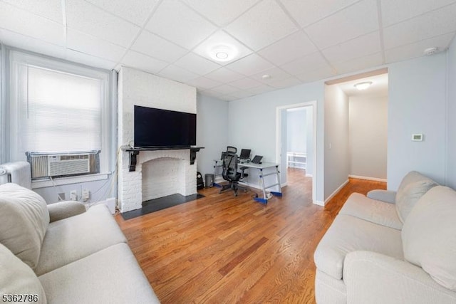 90 Thomas St, Bloomfield Twp, NJ 07003 - living area featuring a paneled ceiling, wood finished floors, and cooling unit